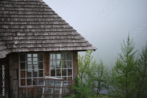 A wooden house in the mountains, with a wonderful view