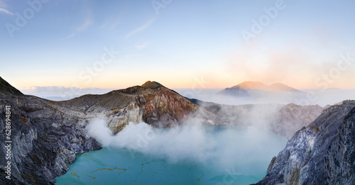 Mount Ijen, a volcano and sulphur mine located near Banyuwangi in East Java, Indonesia. Panoramic image of Ijen crater, a famous touristic destination for tourists in Java island, Indonesia. 