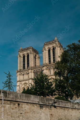 Paris, France. April 22, 2022: Notre Dame Cathedral with blue sky in the city.
