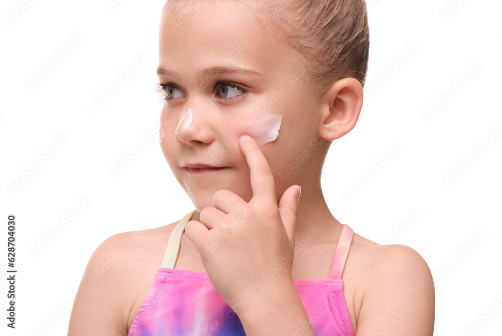 Cute girl applying sun protection cream onto her face against white background Cute girl applying sun protection cream onto her face against white background