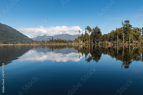 Lake Moana (Brunner) with the Hohonu mountain range in distance on West Coast, South Island, New Zealand