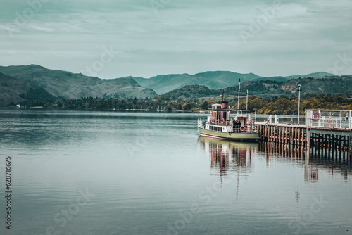 The view of the cruise and the Ullswater in the Lake District in overcast days © Gavin