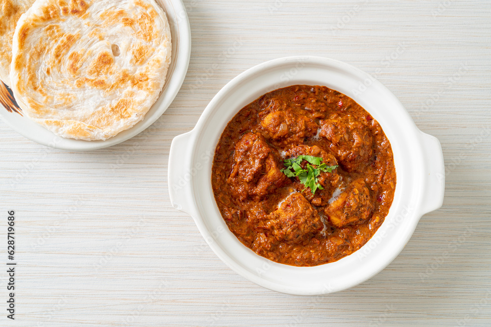 chicken tikka masala spicy curry meat food with roti or naan bread chicken tikka masala spicy curry meat food with roti or naan bread