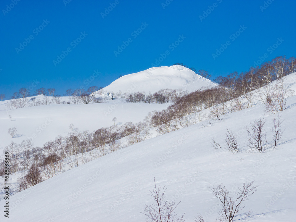 Mountains covered with fresh snow (Niseko, Hokkaido, Japan) Mountains covered with fresh snow (Niseko, Hokkaido, Japan)