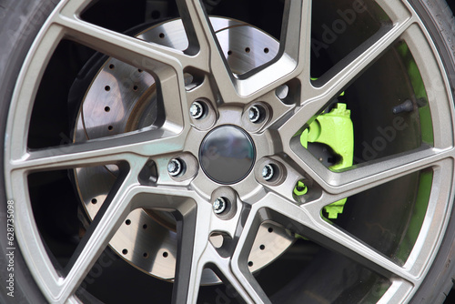 beautiful black alloy wheels made of aluminum on a dark background. exclusive wheels for expensive cars 