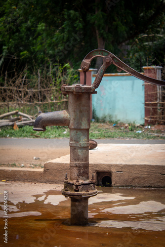 Old fashioned hand pump used for pumping water found in village area