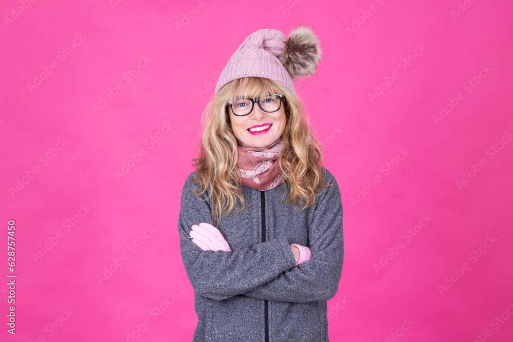 middle-aged woman with crossed arms winter clothes middle-aged woman with crossed arms winter clothes