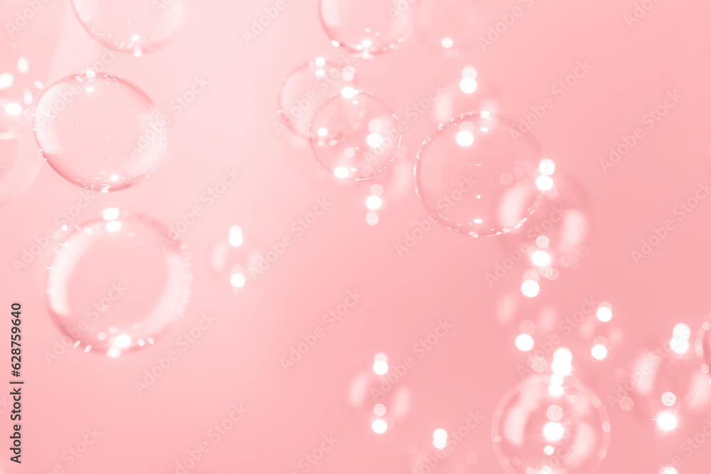 Beautiful Transparent Shiny Pink Soap Bubbles Floating in The Air. Abstract Background, Pink Textured, Celebration Festive Romance Backdrop, Refreshing of Soap Suds, Bubbles Water. Beautiful Transparent Shiny Pink Soap Bubbles Floating in The Air. Abstract Background, Pink Textured, Celebration Festive Romance Backdrop, Refreshing of Soap Suds, Bubbles Water.