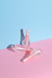 Vaginal enemas on blue pink background. Women's health