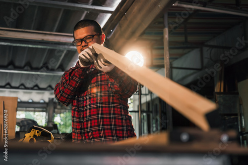 The process of creating snooker cue sticks with handmade work, skilled carpenters create snooker cue sticks, handmade work. Choosing to focus on the picture in only some details.