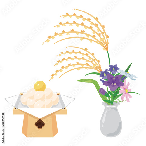 月見団子と花瓶に入った秋の花々
