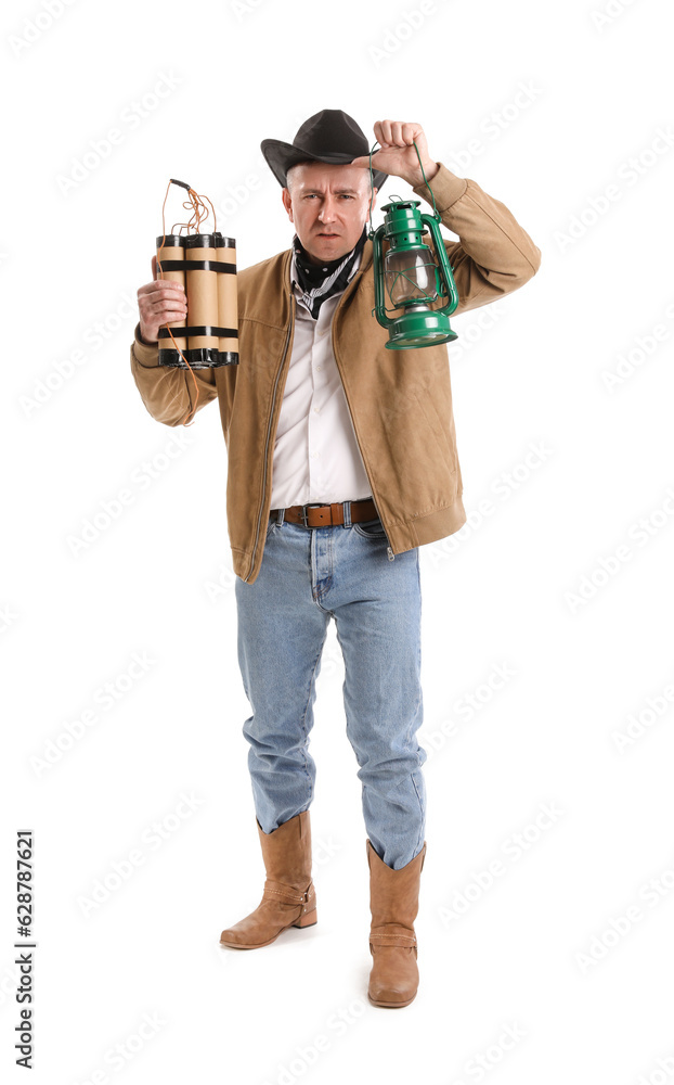 Mature cowboy with explosive and lantern on white background Mature cowboy with explosive and lantern on white background