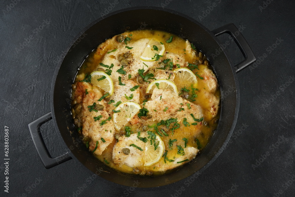 Italian lemon chicken piccata with capers and white wine sauce Italian lemon chicken piccata with capers and white wine sauce