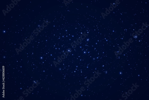 Abstract background. Beautiful blue starry sky. The stars glow in total darkness. Fantasy galaxy. Shiny magical dust particles. Vector illustration © DENYS