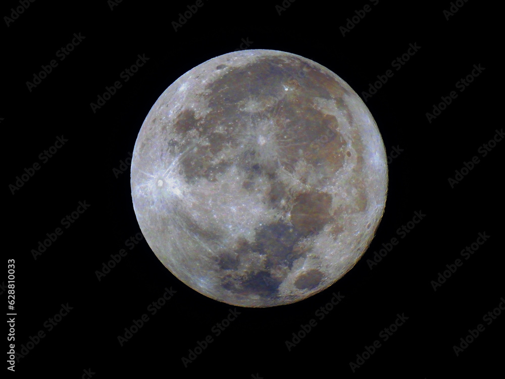 Obraz premium Supermoon on July 4, 2023 : The Buck Moon. Image saturation was processedto display moon color