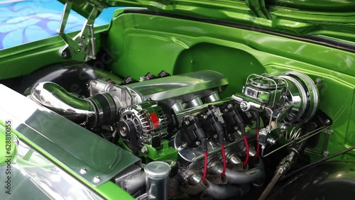 Chrome Engine in Green Automobile at Classic Car Show in Reno Nevada - Shallow Depth of Field