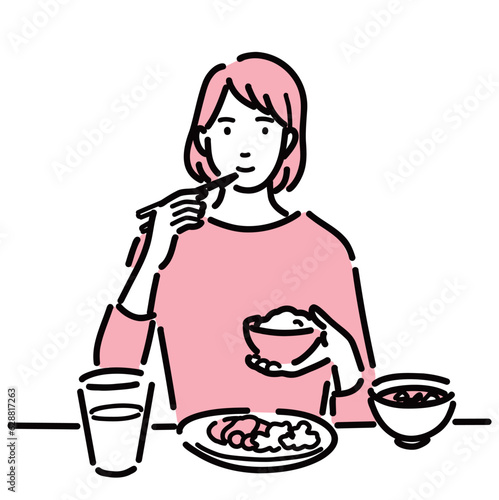 健康的な食事を摂っている女性
