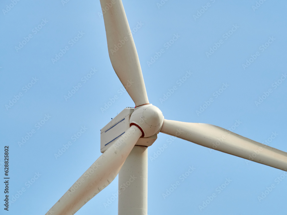 Wind turbine with clear blue sky. Wind turbine with clear blue sky.