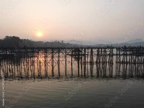 Mon Bridge  the longest wooden bridge in Thailand at Kanchanaburi Province with the morning sun