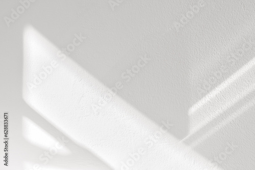 White wall background,Concrete texture with Shadow diagonal,Empty grey Cement  room with Sunlight reflect on white plaster paint,Light effect for Monochrome photo, mockup, Product Design presentation photo