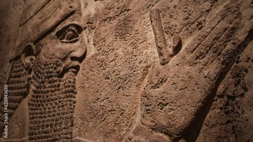 Relief Depicting Nabu, the Ancient Mesopotamian God of Scribes and Wisdom photo