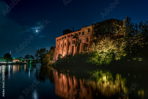 night view of Cassano's castle by river Adda