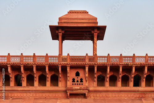 Decorative buildings and walls inside of Agra red fort in India, beautiful architecture elements of ancient indian building, red fort in Agra built of red sandstone, Lal Qila historical building