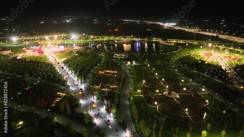 Yangi Ozbekiston (New Uzbekistan) park in Tashkent city at night photo