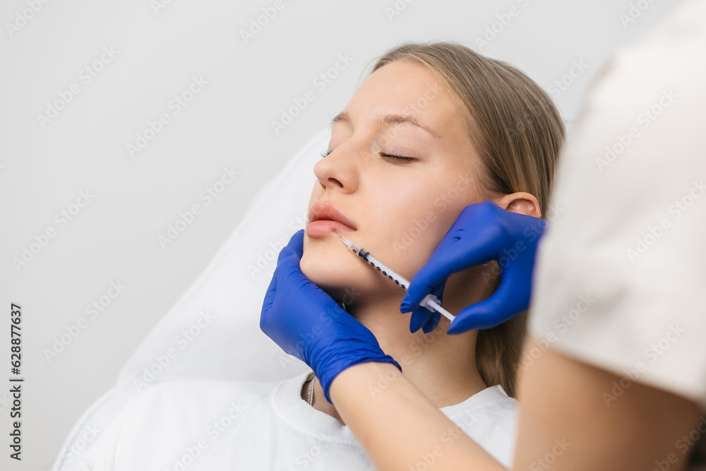 Lip Augmentation. Woman Getting Beauty Injection For Lips Lip Augmentation. Woman Getting Beauty Injection For Lips
