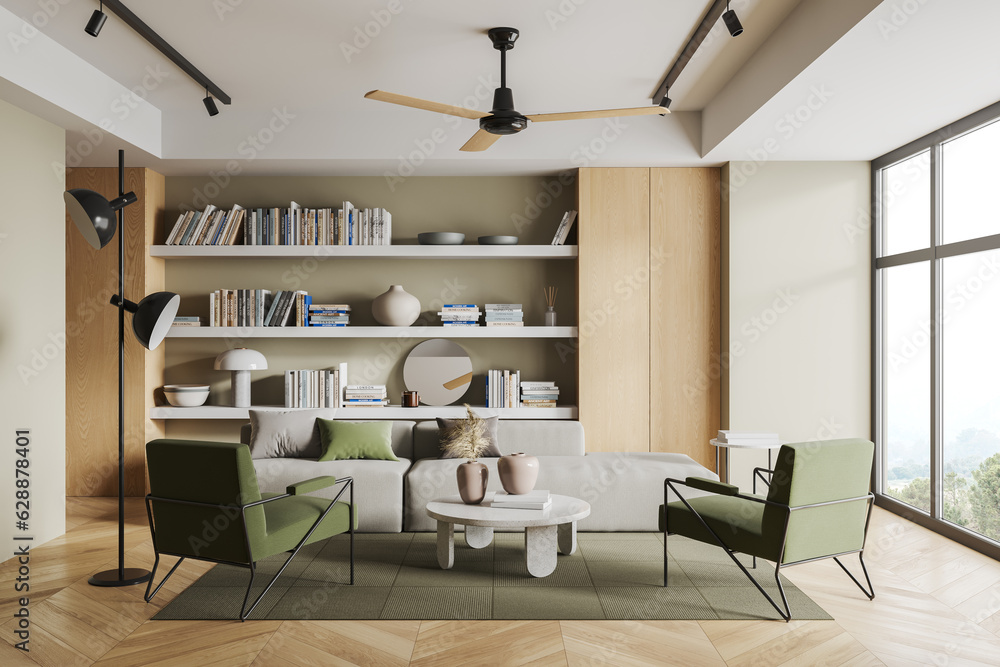 Cozy relaxing room interior with armchairs and couch, bookshelf and window Cozy relaxing room interior with armchairs and couch, bookshelf and window