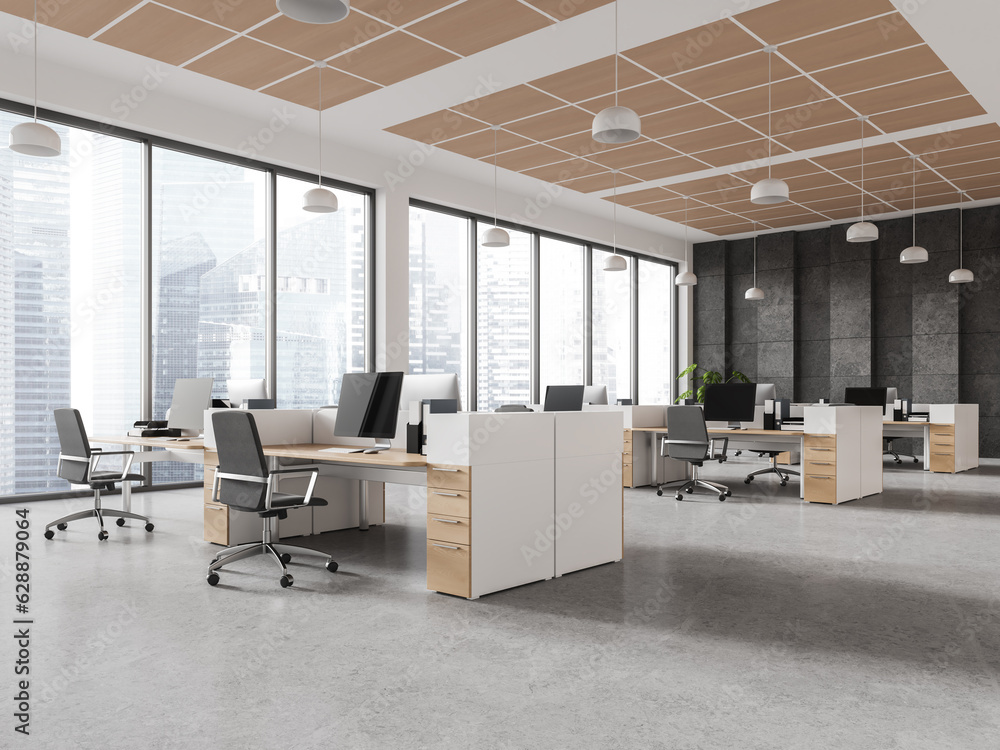 Stylish coworking interior with pc desktop and armchairs in row, window Stylish coworking interior with pc desktop and armchairs in row, window