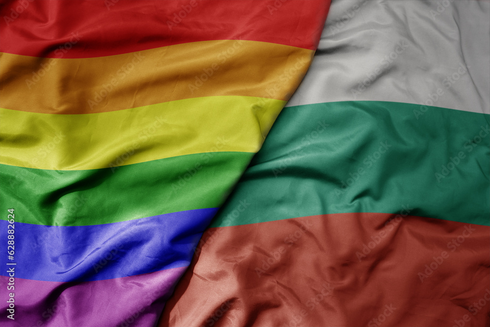 big waving realistic national colorful flag of bulgaria and rainbow gay pride flag .