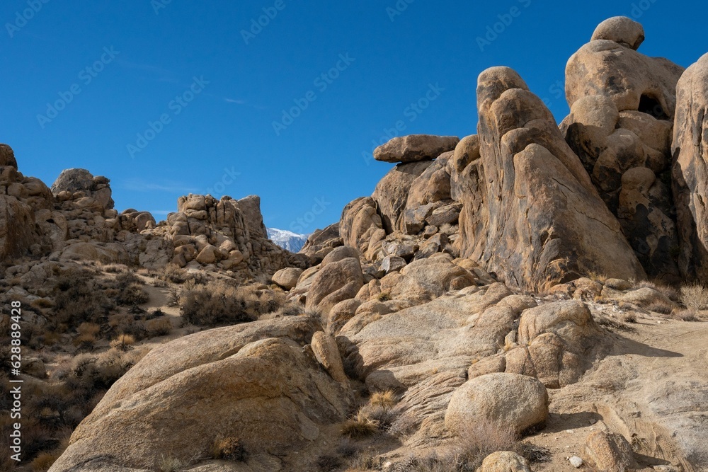 Close-up shot of rocky stones with a vibrant blue sky backdrop