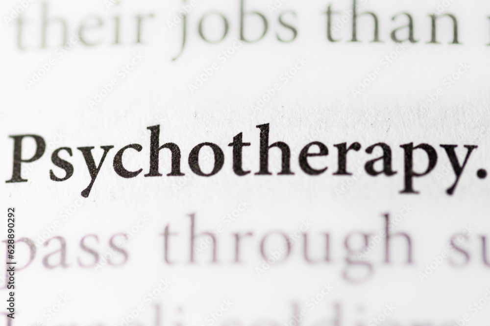 Fototapeta premium close-up of the term Psychotherapy on paper background