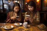 Two women enjoying pastries and coffee while using their smartphones at a table Fictional Character Created By Generative AI