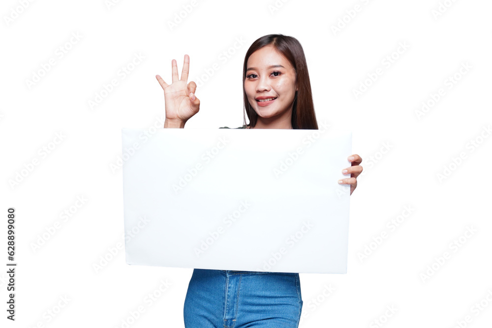 Beautiful Asian woman holding an empty board and okay finger gesture Beautiful Asian woman holding an empty board and okay finger gesture