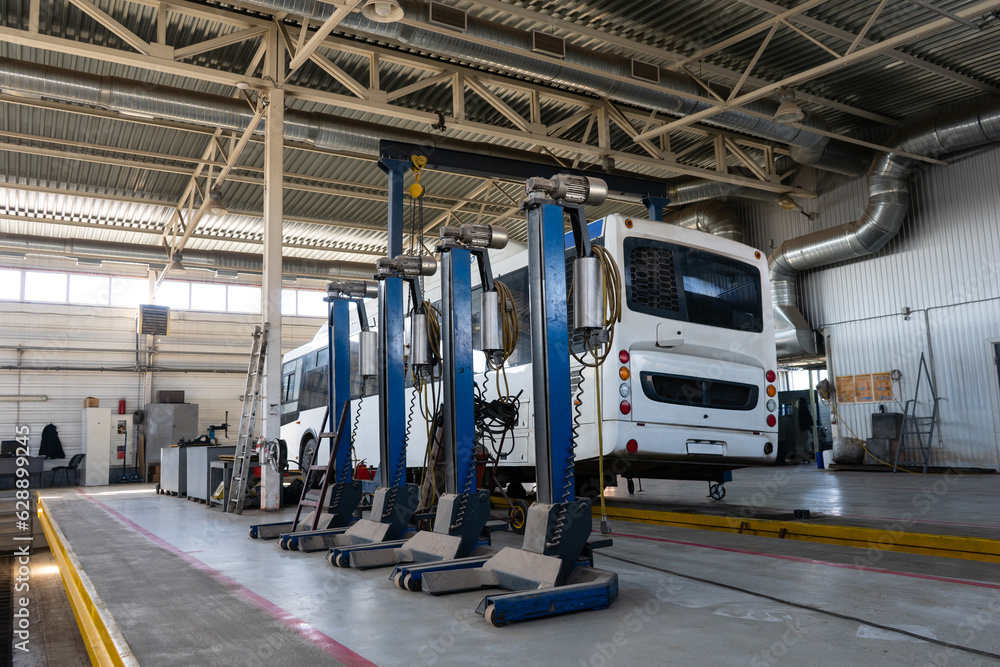 Fototapeta premium Bus repair in car service.