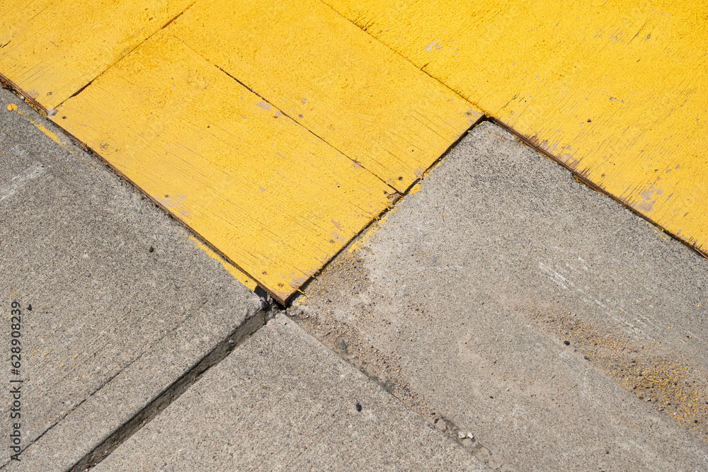Fototapeta premium concrete and plywood painted yellow on the ground