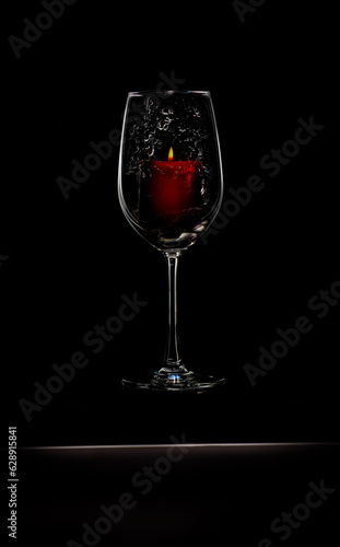 Wine Glass with Candle inside water