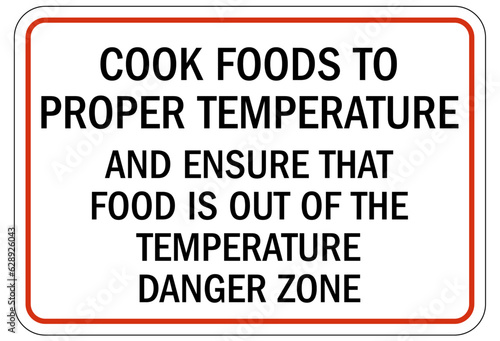 Food safety sign and labels cook foods to proper temperature and ensure that food is out of the temperature danger zone