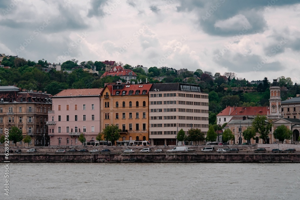 Scenic view of multiple architectural structures situated along the river in Budapest, Hungary