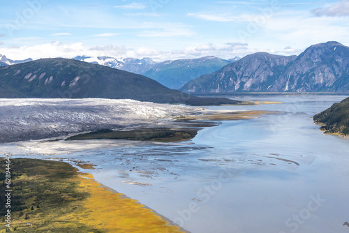 Aerial view of the Taku River, Taku glacier and surrounding mountains which are part of the Juneau icefield. 