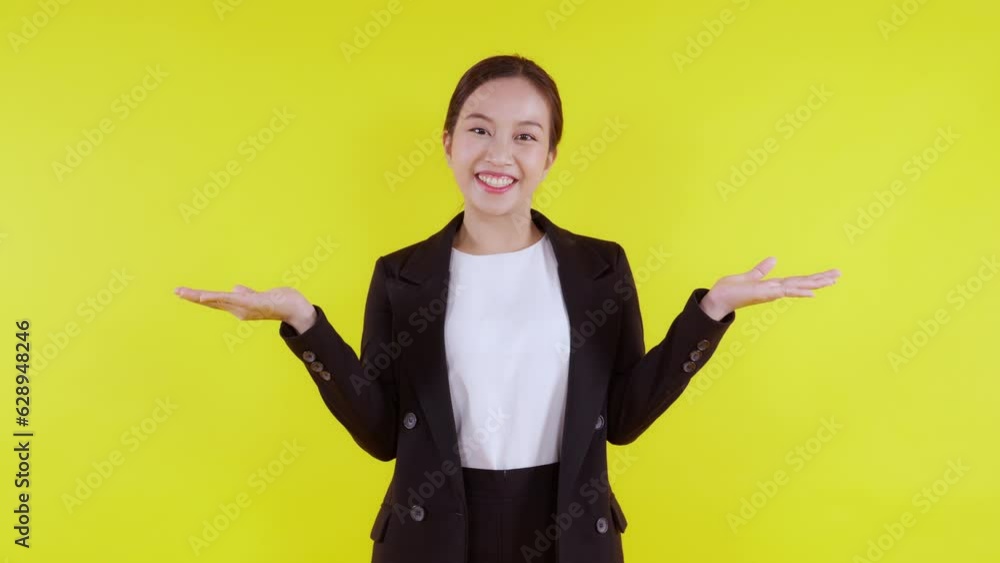 Portrait young asian business woman presenting and showing for decision isolated on yellow background, advertising and marketing, woman surprise and excited, businesswoman choice with expression. Portrait young asian business woman presenting and showing for decision isolated on yellow background, advertising and marketing, woman surprise and excited, businesswoman choice with expression.