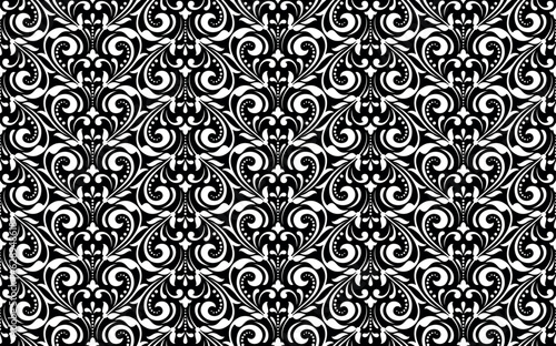 Wallpaper in the style of Baroque. Seamless vector background. White and black floral ornament. Graphic pattern for fabric, wallpaper, packaging. Ornate Damask flower ornament