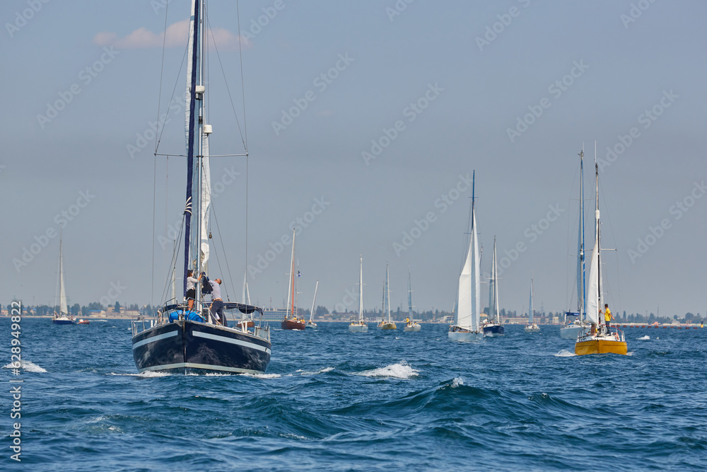 Obraz premium sailing yacht from the bow. Close-up front view of the bow of a sporting sail yacht. sailing boat, sail boat or yacht at sea
