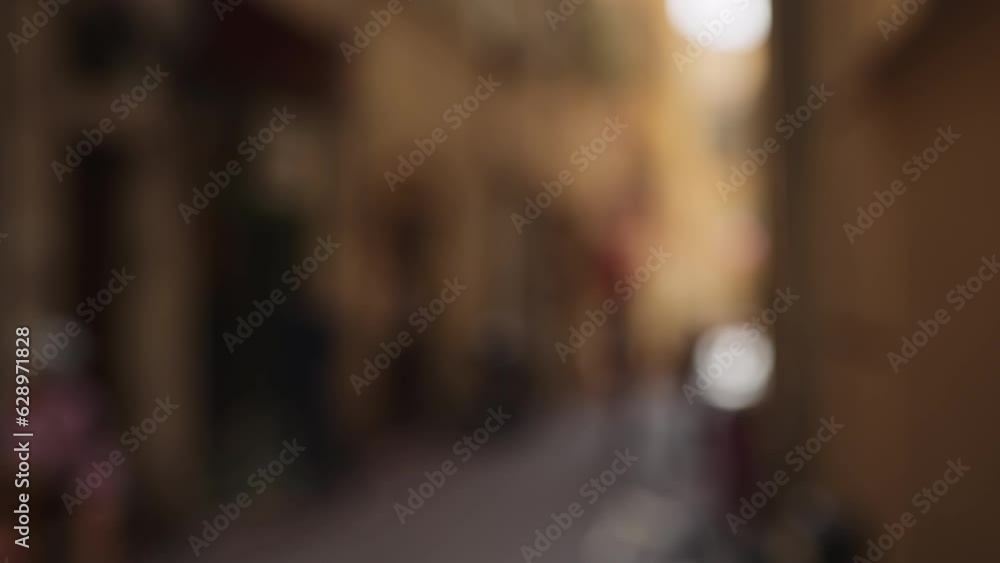 Defocused background of Old city of Nice with vibrant walls and narrow streets Defocused background of Old city of Nice with vibrant walls and narrow streets