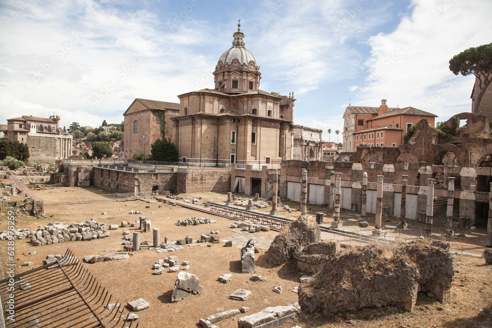 Fototapeta premium Trajan's Forum and Church of Santa Maria di Loreto in the background, Rome, Italy.