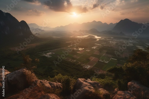 Captivating sunrise over Vientiane Province's karst mountains in Laos, showcased in a breathtaking panorama. Generative AI © Fehnski