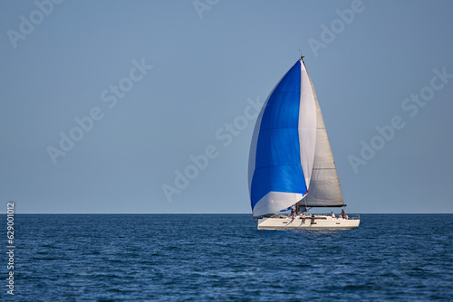 Sailing yacht under gennaker speaker