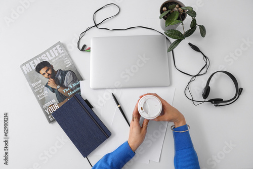 Female hands with cup of co...